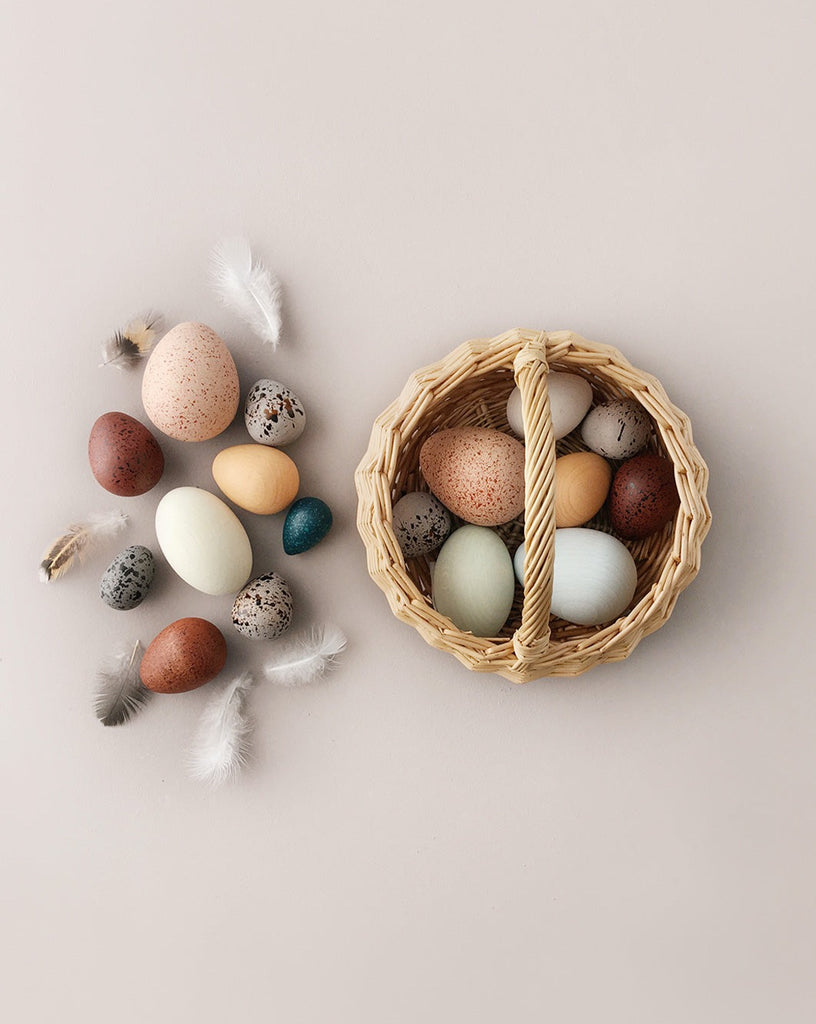 wooden egg toys in a basket