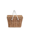 The Olli Ella Piki Basket is a charming rectangular wicker picnic basket, hand-woven from rattan with a delightful woven texture and two white handles, shown closed against a plain white background—perfect for children's picnic outings.