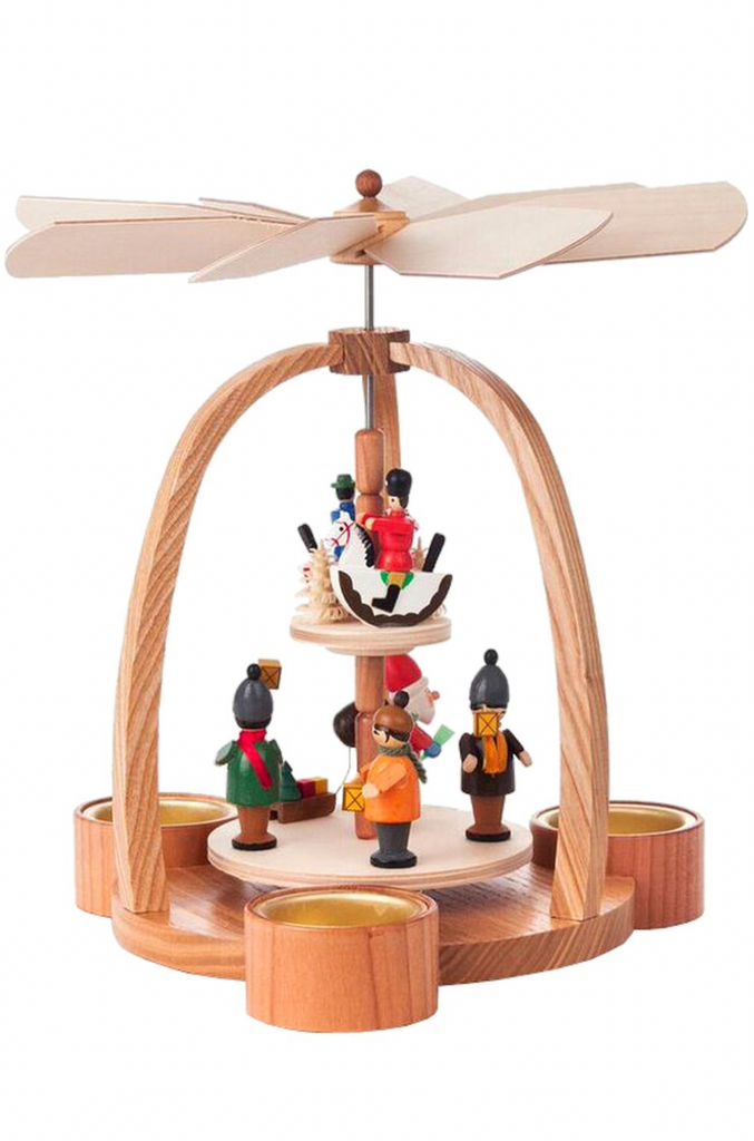 Christian Ulbricht Two Tier Christmas Pyramid made of wood, featuring a rotating tier with hand-painted figures, such as angels and miners, under an arch topped with a rotor blade.