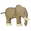 A Holztiger Elephant with a light brown body, white tusks, and white details on its legs. The design is simple and stylized, featuring minimal detailing and a smooth, flat surface. Handcrafted wood toys like this one are made in Europe by HOLZTIGER figures.