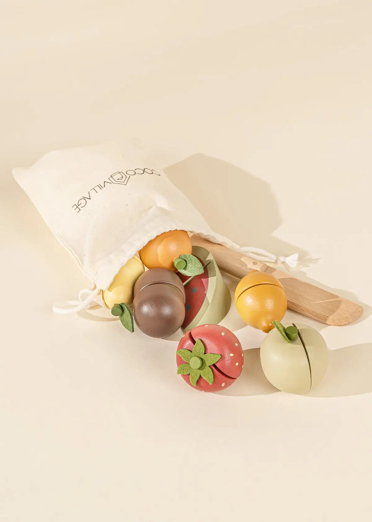 Beige canvas bag with wooden fruits and wooden pretend knife. 