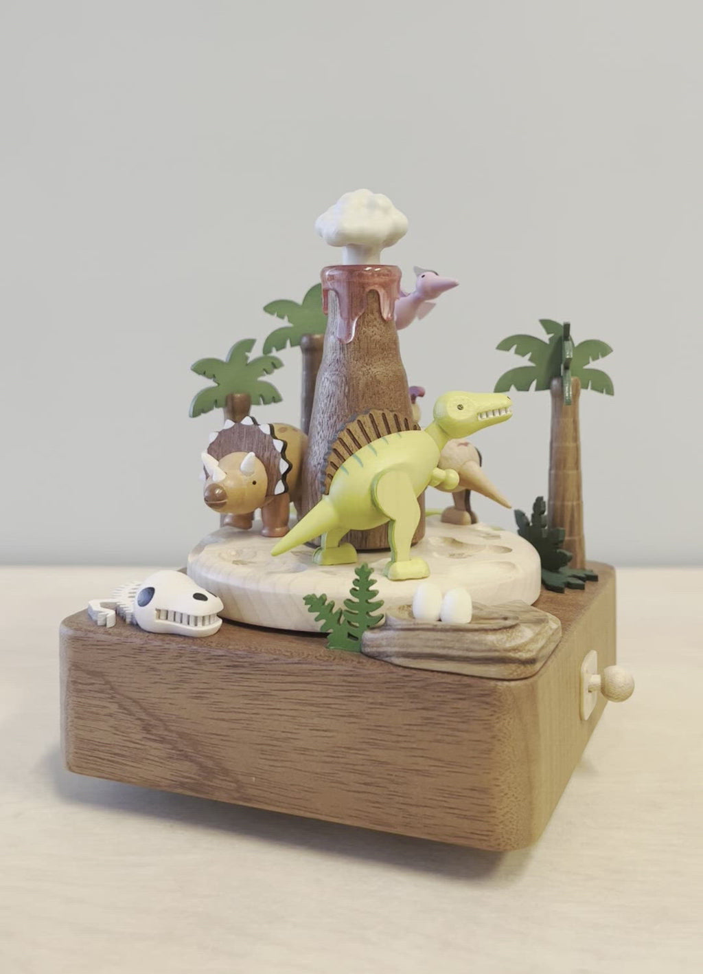 Dinosaur and volcano themed wooden music box