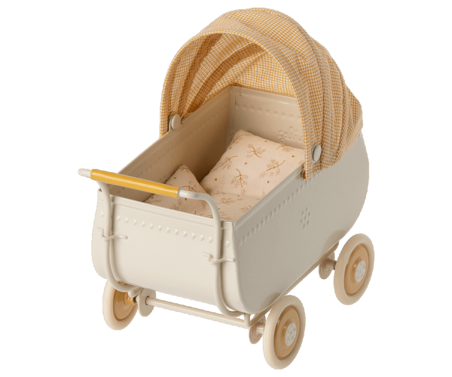 A classic vintage-style Maileg Micro pram in cream with yellow and white plaid fabric on the canopy and white bedding with subtle patterns, set against a light background.