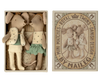 Image of a Maileg Royal Twins in Box, Little Brother and Sister containing two plush toy dogs dressed in vintage-style clothing, accompanied by a decorative packaging label with elegant text and design elements.