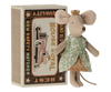 A Maileg Princess Little Sister mouse doll in a floral patterned attire stands next to a vintage "new safety matches" box featuring graphics of a mouse and a car. The items are displayed on a white background.