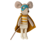 A Maileg Superhero Mouse, Little Brother dressed as a superhero, with a blue mask, yellow cape, and striped yellow and white shirt, resting in a colorful matchbox against a plain background.