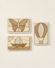 Three Handmade Wooden Puzzle pieces with puzzle-like designs, handmade in Russia. The top-left piece features a butterfly, the top-right shows a hot air balloon, and the bottom-left depicts a sailboat. Each piece combines different shades of light and dark wood, finished with linseed oil for a polished look.