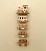 A vertical display of various Handmade Wooden Train - Extra Long components arranged on a light beige background, showcasing different car designs including engines and passenger cars.