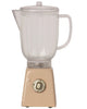 A Maileg Miniature Blender with a transparent glass pitcher and a beige base. The base features a single metallic dial and a small button, giving it a retro appearance. Perfect for pretend play, the blender has a clear plastic lid and a handle for easy pouring.