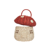 A decorative handmade Olli Ella Red Mushroom Basket, crafted from natural rattan, with a red cap and white spots on top, and a lighter colored base featuring a door and windows, resembling a small house.